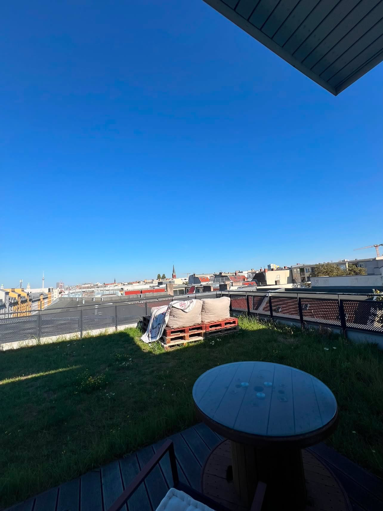 Rooftop location by day — view over Berlin